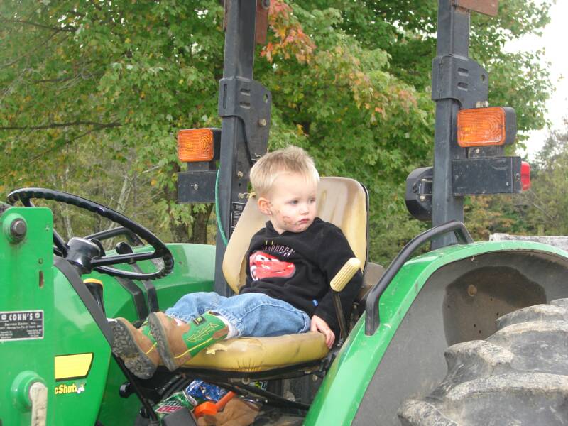 Austin waiting to drive the tractor
