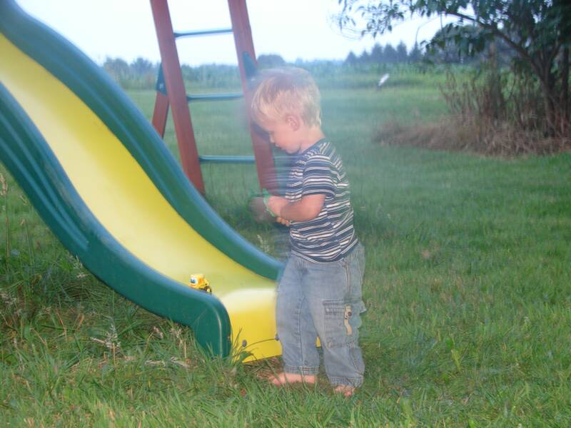Austin playing at the new swingset