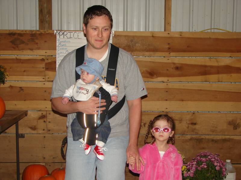 Dad can hardly wait for a long walk through the corn maze